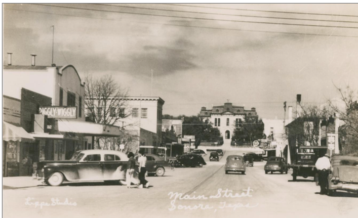 Main Street in Sonora, Texas 1940’s with storefronts lining the street. Main Street in Sonora, Texas 1940’s with storefronts lining the street.