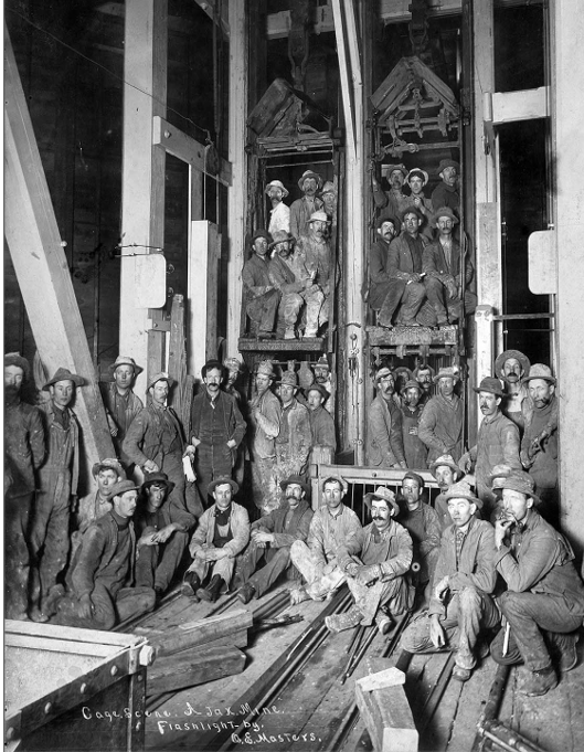 Miners posing at the cages of the Ajax shaft, Victor, Colorado. Miners posing at the cages of the Ajax shaft, Victor, Colorado.